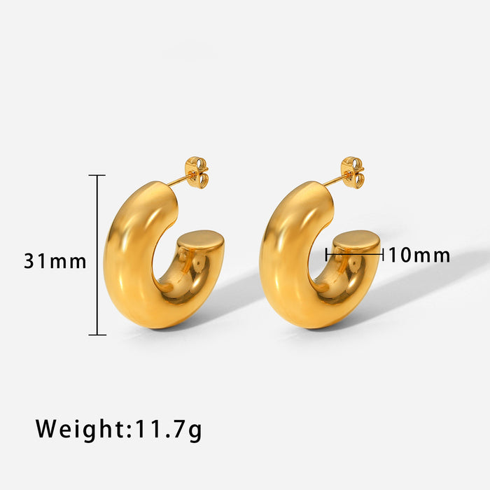 The WOO Crescent Earrings in silver, front view