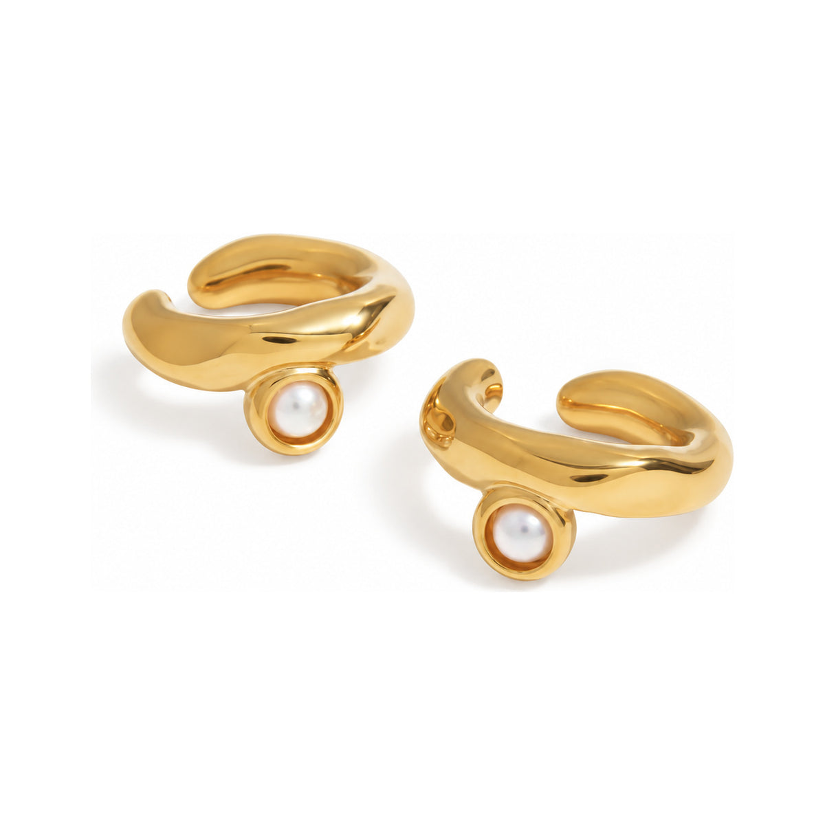 The WOO Soft Focus gold pearl earrings on a pure white background