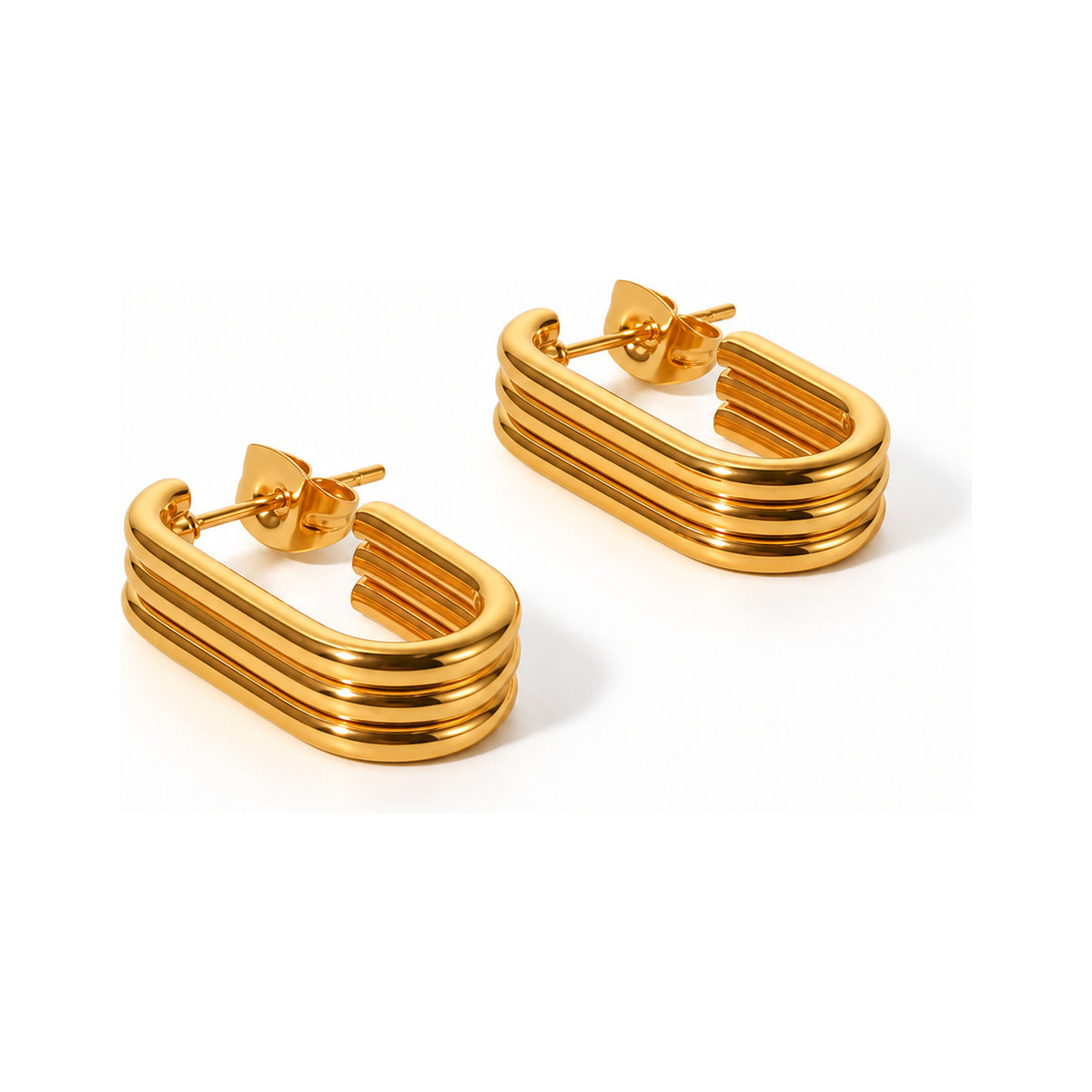 The WOO Triple Take gold earrings on a pure white background