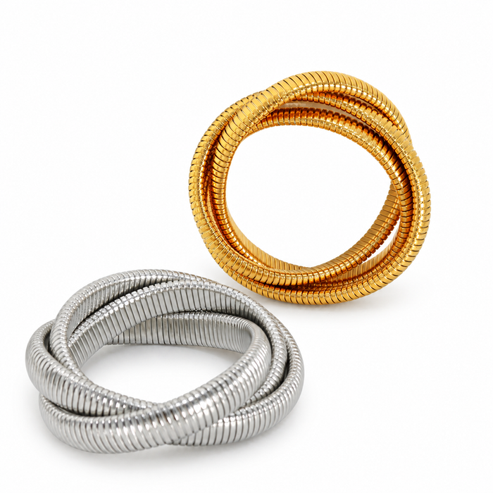 The WOO Continuity Bracelet in gold and silver on a white background